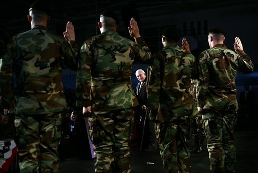 Vice President Dick Cheney administers the Ceremonial Oath of Re-enlistment at a rally for the troops at Fort Leavenworth, Kansas, January 6, 2006. Prior to the ceremony the Vice President delivered remarks and commended the troops for their service in Iraq, Afghanistan and in the war on terrorism. Fort Leavenworth holds the title as the oldest Army installation in continuous active service west of the Mississippi. White House photo by David Bohrer