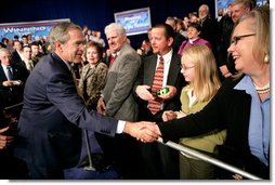 President George W. Bush greets the crowd after remarks on the Global War on Terror in Louisville, Kentucky, Wednesday, Jan. 11, 2006. White House photo by Eric Draper