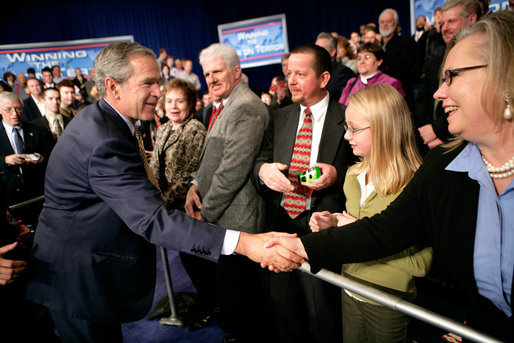 President George W. Bush greets the crowd after remarks on the Global War on Terror in Louisville, Kentucky, Wednesday, Jan. 11, 2006. White House photo by Eric Draper