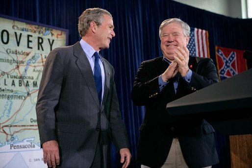 President George W. Bush and Mississippi Gov. Haley Barbour stand together at St. Stanislaus College in Bay St. Louis, Miss., Thursday, Jan. 12, 2006. "Part of the strategy to make sure that the rebuilding effort after the recovery effort worked well was to say to people like Haley, and the Governor of Louisiana and the Mayor of New Orleans, you all develop a strategy," said the President. "It's your state, it's your region, you know the people better than people in Washington -- develop the rebuilding strategy. And the role of the federal government is to coordinate with you and to help." White House photo by Eric Draper