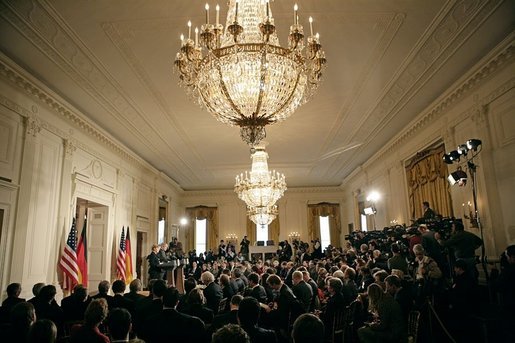 The East Room of the White House is filled as President George W. Bush and German Chancellor Angela Merkel deliver remarks during a joint press availability Friday, Jan. 13, 2006. White House photo by Eric Draper
