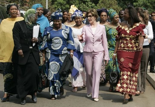 Laura Bush walks with members of the National Center for Women's Development in Abuja, Nigeria to the Women's Hall of Fame January 18, 2006. White House photo by Shealah Craighead