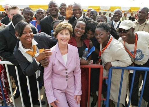 Laura Bush poses with U.S. Embassy workers and their family members, Wednesday, Jan. 18, 2006, during a stop at the U.S. Embassy in Abuja, Nigeria. White House photo by Shealah Craighead