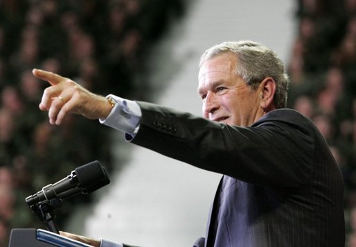 President George W. Bush takes one of many questions from an enthusiastic audience during his remarks on the War on Terror at Kansas State University in Manhattan, Kan., Monday, Jan. 23, 2006. White House photo by Eric Draper