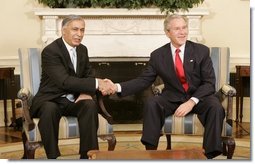 President George W. Bush welcomes Pakistan Prime Minister Shaukat Aziz to the Oval Office, Tuesday, Jan. 24, 2006. White House photo by Kimberlee Hewitt