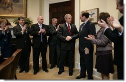 President George W. Bush shakes hands with Judge Samuel A. Alito in the Roosevelt Room of the White House Tuesday, Jan. 31, 2006, after the Senate voted to confirm Judge Alito as the 110th Justice of the Supreme Court. Looking on, from left, are: Harriet Miers, Counsel to the President; Bill Kelley, Deputy Counsel to the President; Steve Schmidt, Deputy Assistant to the President and former Senator Dan Coats (R-Ind.). At right are Mrs. Martha Ann Alito and Ed Gillespie. White House photo by Eric Draper