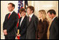 U.S. Supreme Court Justice Samuel A. Alito is seen, Tuesday, Feb. 1, 2006 in the East Room of the White House, with his wife, Martha-Ann, their son Phil, daughter, Laura, and U.S. Supreme Court Chief Justice John Roberts prior to being sworn-in. White House photo by Shealah Craighead