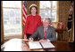 President George W. Bush is joined by Laura Bush, Wed. Feb. 1, 2006 in the Oval Office at the White House, as he signs a proclamation in honor of American Heart Month. White House photo by Paul Morse