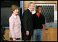 President George W. Bush and Mrs. Laura Bush greet student Michael Harrell during a visit with science and engineering students at the Yvonne A. Ewell Townview Magnet Center in Dallas, Texas, Friday, Feb. 3, 2006. White House photo by Eric Draper