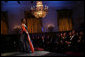President George W. Bush and Laura Bush listen to soprano Harolyn Blackwell perform in the East Room of the White House during a dinner in honor of The Dance Theatre of Harlem Monday, February 6, 2006. White House photo by Shealah Craighead