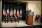 With his predecessor, Alan Greenspan, looking on, Chairman Ben Bernanke addresses President George W. Bush and others after being sworn in to the Federal Reserve post. Also on stage with the President are Mrs. Anna Bernanke and Roger W. Ferguson, Jr., Vice Chairman of the Federal Reserve. White House photo by Kimberlee Hewitt
