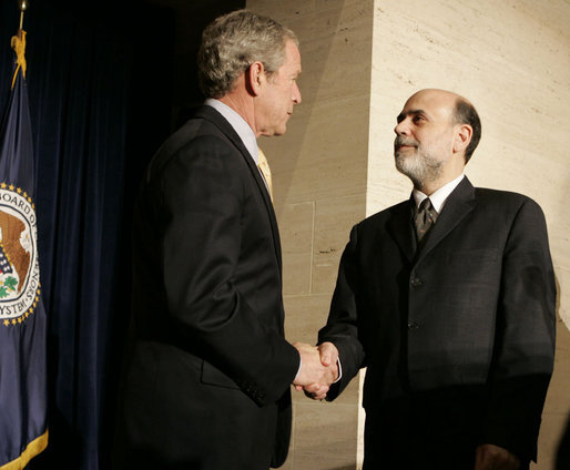 President George W. Bush shakes the hand of Ben Bernanke after he was sworn in Monday, Feb. 6, 2006, as Chairman of the Federal Reserve. White House photo by Kimberlee Hewitt