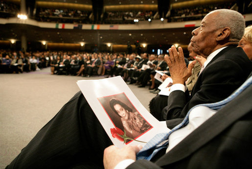 Guests listen to speakers at the homegoing celebration for Coretta Scott King, Tuesday, Feb. 7, 2006 at the New Birth Missionary Church in Atlanta, Ga., attended by President George W. Bush and Mrs. Laura Bush. White House photo by Eric Draper