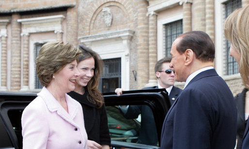 Mrs. Laura Bush and daughter, Barbara Bush, are greeted on their arrival by Italian Prime Minister Silvio Berlusconi, Thursday, Feb. 9, 2006 to the Villa Madama in Rome. White House photo by Shealah Craighead