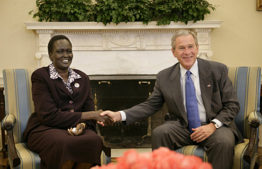President George W. Bush welcomes Rebecca Garang, the Minister of Transportation, Roads and Bridges of the Government of Southern Sudan, to the Oval Office, Friday, Feb. 10, 2006 at the White House. White House photo by Eric Draper