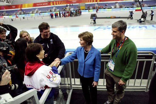 Laura Bush and former Olympian Dr. Eric Heiden meets with the family and parents of US speed skater Chad Hedrick after Hedrick finished first place in his heat taking the first US gold medal in the 2006 Winter Olympics in Turin, Italy. White House photo by Shealah Craighead