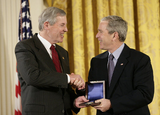 President George W. Bush presents a National Medal of Technology, Monday, Feb. 13, 2006 to Henry L. Nordoff, president, chairman and CEO of Gen-Probe Incorporated of San Diego, Calif., during ceremonies in the East Room of the White House. White House photo by Eric Draper