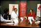 Laura Bush participates in a roundtable with Delphia Daniel, heart disease survivor, and Dr. Paul Colavita, Cardiologist, Sanger Clinic, at Carolinas Medical Center Wednesday, Feb. 15, 2006, in Charlotte, NC, to promote heart disease awareness, education and prevention. Heart disease is the leading cause of death of women in the US. White House photo by Shealah Craighead