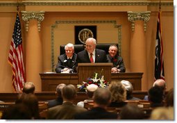 Vice President Cheney recounts his early days in politics during an address to a joint session of the Wyoming State Legislature in Cheyenne, Friday, February 17, 2006. “I would not be where I am today were it not for the friendship and the confidence of people all across this state,” the Vice President said. “It's always good to be home. And this morning, as an officeholder -- and, more than that, as a citizen of Wyoming -- I count it a high honor to be in such distinguished company.”  White House photo by David Bohrer