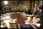 President George W. Bush answers reporters questions during a Cabinet meeting Thursday, Feb. 23, 2006 at the White House, where he condemned the destruction of the Golden Mosque in Iraq. White House photo by Eric Draper