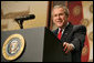 President George W. Bush addresses the American Legion on the global war on terror, Friday, Feb. 24, 2006 at the Capital Hilton Hotel in Washington. President Bush voiced his support for free elections in the Middle East, saying that free elections are instruments of change, giving people an opportunity to organize, express views and change their existing order, strengthening the forces of freedom and allowing citizens to take control of their own destiny. White House photo by Kimberlee Hewitt