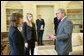 President George W. Bush greets Irina Krasovskaya, left, and Svyatlana Zavadskaya, widows of a pro-democracy businessman and an independent journalist who "disappeared" in Belarus in 1999 and 2000 respectively. During a meeting on Monday, February 27, 2006 at the White House, the President discussed the state of democracy and human rights in Belarus in the run-up to the March 19 Belarusian presidential election, and stressed his commitment to support the people of Belarus in their effort to determine their own future. The United States is deeply concerned about the Belarusian government's conduct leading up to the election, harassment of civil society, and failure to investigate seriously the cases of the disappeared. White House photo by Paul Morse
