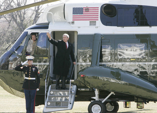 President George W. Bush waves as he prepares to leave the South Lawn of White House aboard Marine One, Tuesday, Feb. 28, 2006, to Andrews Air Force Base to begin a five day trip to visit India and Pakistan. White House photo by Kimberlee Hewitt