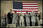 President George W. Bush meets and thanks a group of U.S. and Coalition troops, Wednesday, March 1, 2006, during a visit to Bagram Air Base in Afghanistan, where President Bush thanked the troops for their service in defense of freedom. White House photo by Eric Draper