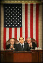 Vice President Dick Cheney and House Speaker J. Dennis Hastert applaud Italian Prime Minister Silvio Berlusconi during an address to a joint session of Congress, Wednesday, March 1, 2006. The Prime Minister’s speech to the joint session was part of a three-day visit to Washington that included a visit to the White House, where he met with President George W. Bush and discussed Italy’s continued allied relationship with the US in the global war on terror. White House photo by David Bohrer