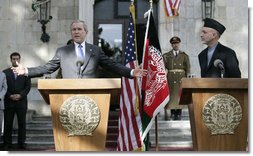 President George W. Bush gestures as he speaks during a press availability Wednesday, March 1, 2006, with Afghanistan President Hamid Karzai at the Presidential Palace in Kabul. "One of the messages I want to say to the people of Afghanistan," President Bush said, " is it's our country's pleasure and honor to be involved with the future of this country." White House photo by Eric Draper