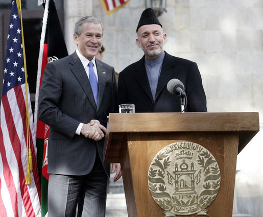 President George W. Bush and President Hamid Karzai of Afghanistan appear together Wednesday, March 1, 2006 at a joint news conference at the Presidential Palace in Kabul, Afganistan. White House photo by Eric Draper