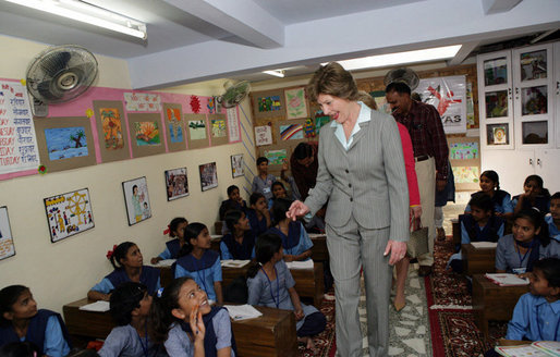 Mrs. Laura Bush meets and waves to children during her tour of Prayas, Thursday, March 2, 2006, in New Delhi, India. White House photo by Shealah Craighead