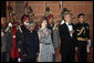 President and Mrs. Bush stand with India's President A.P.J. Abdul Kalam during the playing of their respective national anthems Thursday, March 2, 2006, at the State Dinner in New Delhi. White House photo by Eric Draper