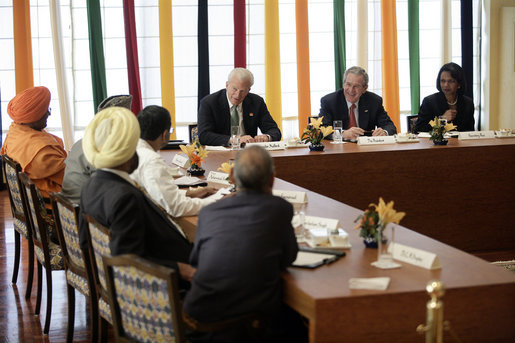 President George W. Bush and Secretary of State Condoleezza Rice are joined by Ambassador David Mulford during a meeting with religious leaders Thursday, March 2, 2006, at the Maurya Sheraton Hotel and Towers in New Delhi. White House photo by Eric Draper
