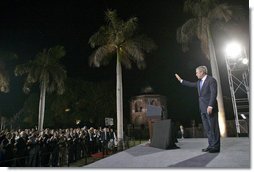 President George W. Bush waves as he leaves the stage Friday, March 3, 2006, after delivering remarks at Purana Qila in New Delhi before departing India for Pakistan.  White House photo by Eric Draper
