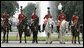 A Pakistan cavalry honor guard welcomes President George W. Bush to Aiwan-e-Sadr in Islamabad, Pakistan, Saturday, March 4, 2006. White House photo by Eric Draper