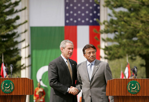 President George W. Bush and Pakistan President Pervez Musharraf stand together following their joint news conference at Aiwan-e-Sadr in Islamabad, Pakistan, Saturday, March 4, 2006. White House photo by Shealah Craighead