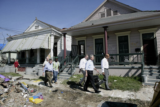 President George W. Bush views the destruction to homes and debris piles while touring the lower 9th Ward of New Orleans, Wednesday, March 8, 2006 with New Orleans Mayor Ray Nagin, right. White House photo by Eric Draper