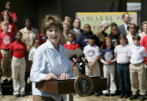 Mrs. Laura Bush addresses a crowd at the College Park Elementary School in Gautier, Miss., Wednesday, March 8, 2006, announcing the establishment of The Gulf Coast School Library Recovery Initiative, to help Gulf Coast schools that were damaged by the hurricanes rebuild their book and material collections. The initiative was established by the Laura Bush Foundation for American Libraries. White House photo by Eric Draper