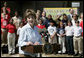 Mrs. Laura Bush addresses a crowd at the College Park Elementary School in Gautier, Miss., Wednesday, March 8, 2006, announcing the establishment of The Gulf Coast School Library Recovery Initiative, to help Gulf Coast schools that were damaged by the hurricanes rebuild their book and material collections. The initiative was established by the Laura Bush Foundation for American Libraries. White House photo by Eric Draper