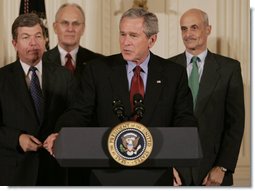 President George W. Bush addresses the audience after signing H.R. 3199, USA Patriot Improvement and Reauthorization Act of 2005, Thursday, March 9, 2006 in the East Room of the White House. President Bush is joined by U.S. Congressman Roy Blunt, R-Mo., left, U.S. Senator Larry Craig, R-Id., background-left, and Homeland Security Secretary Michael Chertoff. White House photo by Kimberlee Hewitt