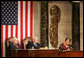 Vice President Dick Cheney and House Speaker J. Dennis Hastert listen as President Ellen Johnson-Sirleaf, Liberia and Africa’s first female head-of state, addresses a Joint Meeting of Congress held in her honor at the Capitol, Wednesday, March 15, 2006. White House photo by David Bohrer