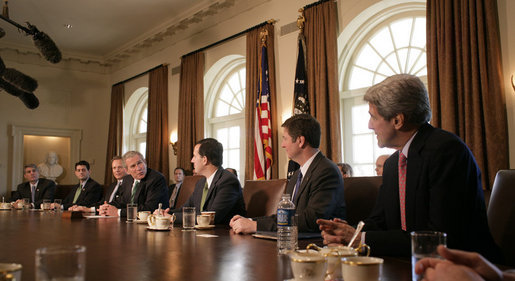 President George W. Bush meets with members of Congress Thursday, March 16, 2006, in the Cabinet Room of the White House. The President thanked the attendees and singled out Sen. John Kerry (D-Mass.) saying, "I can remember on the campaign trail, he said that he supported a line-item veto, and he is following through on his word by being here at the table." White House photo by Paul Morse