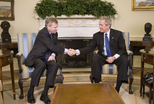 President George W. Bush welcomes NATO Secretary General Jaap de Hoop Scheffer to the Oval Office at the White House, Monday, March 20, 2006 in Washington. White House photo by Kimberlee Hewitt