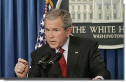 In his second press conference of the year, President George W. Bush answers reporters questions, Tuesday morning, March 21, 2006, during a news briefing at the White House. White House photo by Paul Morse