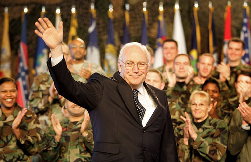 Vice President Dick Cheney waves in response to a warm welcome given by the troops and their families at a rally at Scott Air Base in Illinois, Tuesday, March 21, 2006. White House photo by David Bohrer
