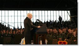Vice President Dick Cheney participates in a rally with the troops at Scott Air Base, home of the US Transportation Command (USTRANSCOM), Tuesday, March 21, 2006. As the single manager of America's global defense transportation system, USTRANSCOM is tasked with the coordination of people and transportation assets that allows the US to project and sustain forces around the world.  White House photo by David Bohrer