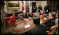 President George W. Bush and Mrs. Laura Bush meet Tuesday, March 21, 2006 in the Roosevelt Room of the White House, with members of the Iraq and Afghanistan Non-Govermental Organizations. White House photo by Eric Draper