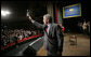 President George W. Bush waves as he leaves the Capitol Music Hall stage following his address on the global war on terror, Wednesday, March 22, 2006 in Wheeling, W. Va. White House photo by Eric Draper