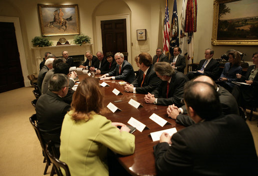 President George W. Bush speaks with participants in a meeting on immigration reform Thursday, March 23, 2006, in the Roosevelt Room of the White House. White House photo by Eric Draper